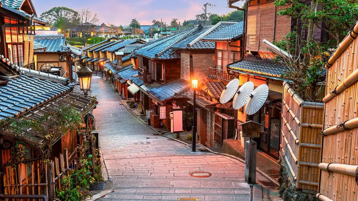 Traditional lanes and tiled roofs in Kyoto at dusk
